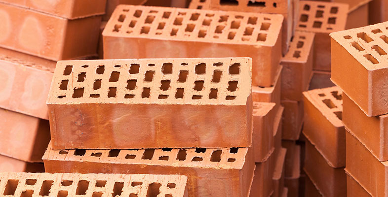 What is the definition of refractory brick?